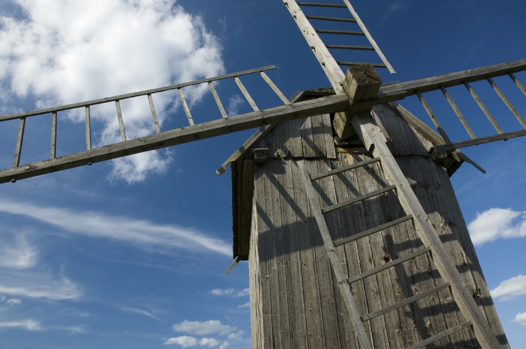 Old wooden windmill in the countryside